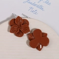 Detail of glossy brown double-layered resin flower charms for DIY hair accessories - Brown
