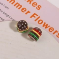 Macro shot of 3D resin mini burger charms for DIY jewelry and hair accessories craft - Gray