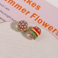 Macro detail of 3D resin hamburger DIY accessories for handmade earrings and crafts - White Pink