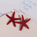Detailed close-up of red resin starfish patches with realistic matte texture for DIY crafts - Matte Red