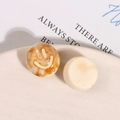 Macro detail of marble resin smiley face charms and smooth cream round DIY accessories - Marble Pattern Smiley (Cream White) / Milky White