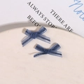 Close-up of blue organza fabric ribbon bows for DIY nail art and clothing decoration - Dark Blue