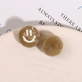 Close-up of brown marble resin round earring charms with cute white smiley face designs - Beige Coffee