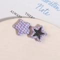 Detail of star-shaped fabric buttons and silver mirror inserts for DIY headwear accessories - Purple