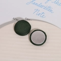 Macro detail of dark green silk fabric round button with metallic silver flat back base - Green Satin (D02—4—14) / Green