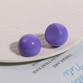 Detailed macro view of Morandi purple resin spherical charms for DIY earring making - Purple