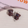 Macro view of vertical hole bear glass beads showing the internal thread structure - 1 Piece / Gray Blue
