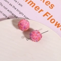 Macro detail of pink glitter crystal ball resin beads for DIY jewelry and earring making - Rose Red