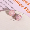 Macro shot of colorful sugar ball resin beads with glitter for DIY jewelry making - White