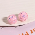 Detailed macro view of pink Shamballa sugar beads with sparkling star-shaped sequins - Pink (1 Piece)