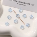 Primer plano de cuentas de vidrio azul claro de 8 mm en forma de estrella para joyas DIY - 1 Pieza (8mm) / Azul claro