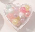 Mix of colorful macabre pearl beads in heart-shaped transparent hanging container - Style A