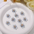 Set of 10 translucent blue resin flower charms with golden pistils for DIY jewelry - 1 Piece / Blue