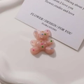 Detailed view of cute resin bear charms with colorful dots for DIY accessories - Pink