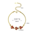 Gold plated stainless steel bangle with three red zircon heart clusters and extension chain - Heart (SL-00038) / Gold