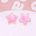 Detailed view of pink glitter and solid resin star charms for DIY earring accessories - 1 Piece / Pink