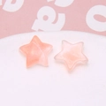 Macro detail of glittery pink star resin charms for DIY earrings and hair accessories - 1 Piece / Orange