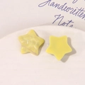 Detail of yellow star resin DIY accessories with silver glitter and matte finish - Yellow