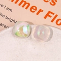 Macro detail of square iridescent resin patches with shimmering glitter effect for DIY jewelry - Iridescent White Square Style
