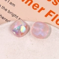 Close-up of iridescent light pink resin square charms with a pearlescent shimmer finish - Iridescent Pink Square Style