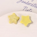 Star-shaped resin accessories in marbled yellow and glittery finishes for DIY jewelry - Yellow