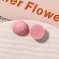 Dettaglio di cabochon in resina rosa lucida per gioielli fai-da-te e accessori per capelli - Rosa
