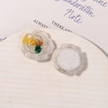 Macro shot of resin rose flower charms with starry glitter back for DIY jewelry making - White Base Yellow Green