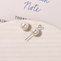 Detailed view of matte white pearls and silver eye pins for DIY jewelry making - Artificial Pearl (1 Piece) / 10mm / White