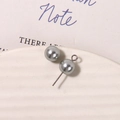 Macro detail of matte silver-grey pearl beads with silver metal pin on a white tray - Artificial Pearl (1 Piece) / 8mm / Gray