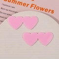 Detail showing two linked pink acrylic hearts for DIY hair accessories and crafts - Light Pink