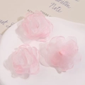 Detailed view of three pink organza mesh flower petals for DIY hair accessories - Light Pink