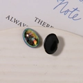 Vista dettagliata dell'intarsio in conchiglia iridata e retro nero liscio dei ciondoli ovali - Piccolo (1 Pezzo, 10x14mm) / Nero