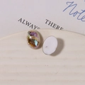 Macro detail of oval resin shell charms with iridescent foil for DIY jewelry making - Small (1 Piece, 10x14mm) / White