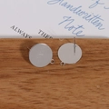 Detail shot of gold-plated flat round stud earring components with small hanging loops - 16mm / Silver