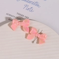 Detail of pink resin bow charms with pearl finish and metal loops for DIY crafts - 1 Piece/Pack / Deep Pink
