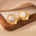Close-up of golden vintage stud earrings with white marble stone and small side pearls - Geometric Rhombus White Stone Artificial Pearl Stud 1692