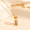 Detail of gold-plated stainless steel necklace with transparent cylinder pendant and gold foil - Yellow Stone Style (0837)