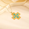 Macro detail of gold cross necklace with turquoise stones on elegant white satin - Small Cross Turquoise Necklace (0885)