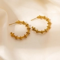 Irregular hollow spring hoop earrings in golden twisted wire wrap design for women - Bamboo Joint Spring Earrings (0089) / Gold