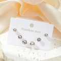 Trois paires de boucles d'oreilles en acier inoxydable doré avec zircons ronds sur carte - Lot de 3 paires / Style Rond Doré