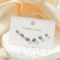 Ensemble de six boucles d'oreilles en acier inoxydable avec zircons ronds de tailles dégradées - Lot de 3 paires / Style Rond Argent