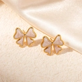 Elegant gold bow earrings with marble pink inlay on champagne satin background - White Enamel Butterfly Shape (0328B)