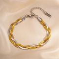 Macro detail of tricolor braided herringbone chain bracelet with S.STEEL stamp - Mixed Color Bracelet (0094)