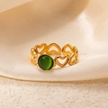 Macro view of gold vintage heart-shaped ring with green cat-eye gemstone inlay - Openwork Heart Green Stone Adjustable Style (TYR1017)