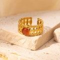 Retro gold woven stainless steel ring featuring a vibrant orange gemstone inlay - Braided Reddish Brown Stone Adjustable Style (TYR0836)