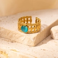 Retro gold braided ring featuring an oval lake blue stone in a geometric open design - Braided Blue Cat's Eye Adjustable Style (TYR0839)