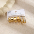 Set di tre paia di orecchini in acciaio dorato con cerchi minimalisti e zirconi lucidi - Zirconia Completa Grande (1188) / Oro