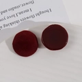 Plush faceted deep red resin cabochons on a white ceramic tray for DIY jewelry making - Burgundy
