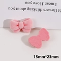 Pink flocked bow DIY accessory 15mm by 23mm resin charm detail and smooth texture - Pink Bowknot