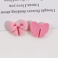 Detailed front and back views of pink flocked bow resin DIY hair accessory components - Pink